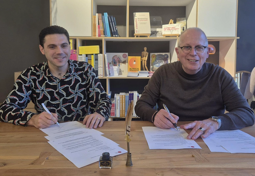 dr. John van der Starre en Paul de Kuyper van uitgeverij Verhaal met Impact